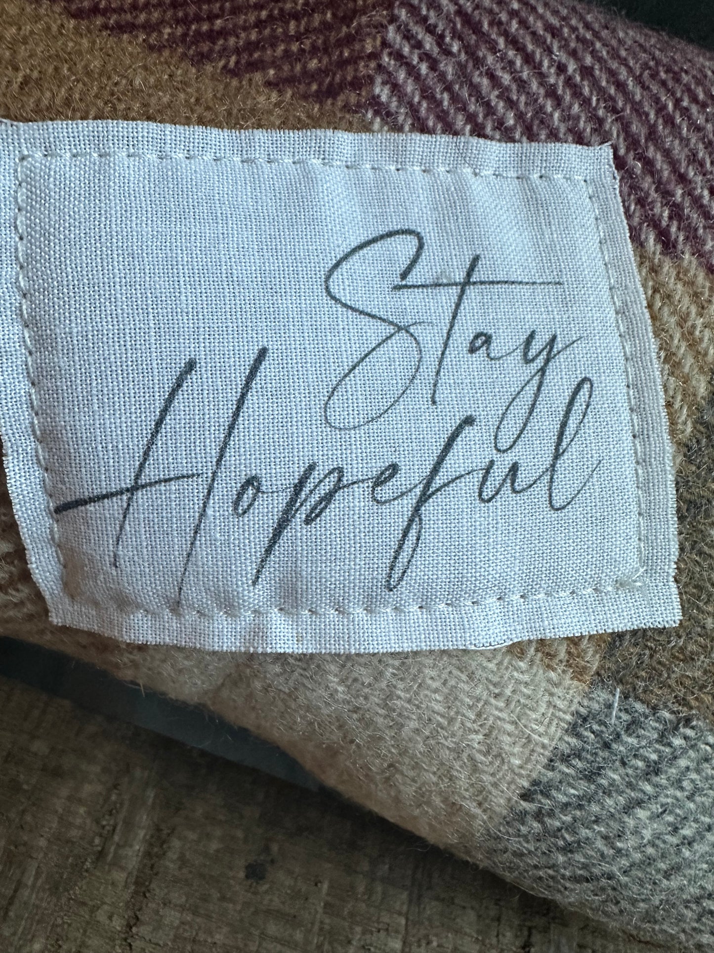 Wool accent pillow reminder: Stay Hopeful